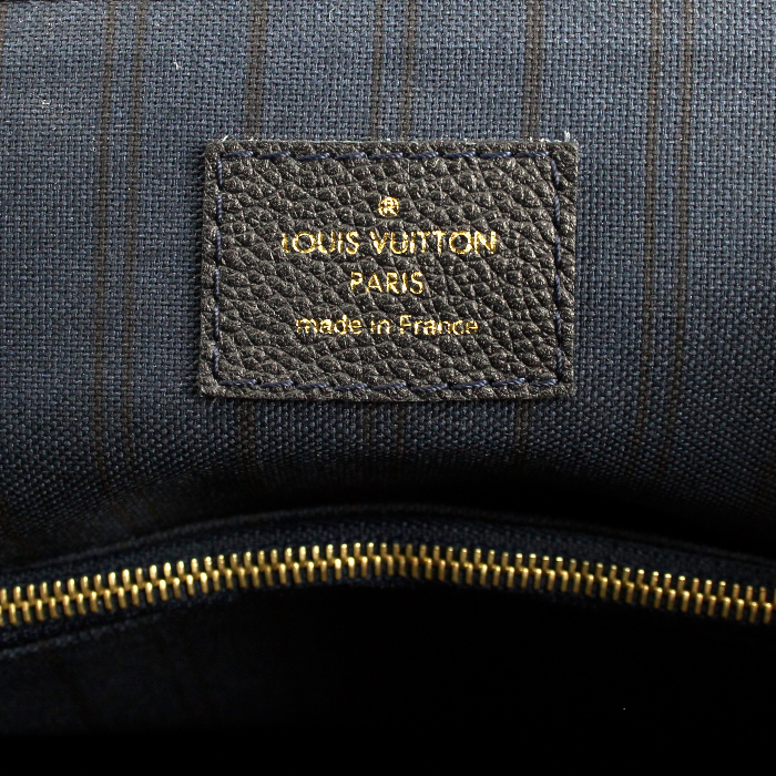 Louis Vuitton handbag in blue monogram leather - Detail D4