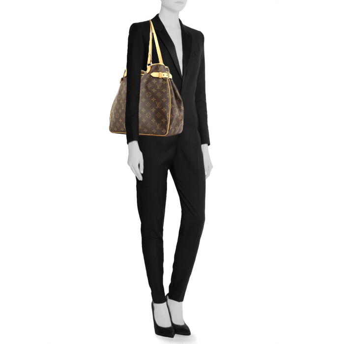 Louis Vuitton handbag in monogram canvas and natural leather - Detail D1