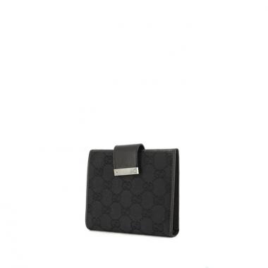 Gucci wallet in monogram canvas and black leather
