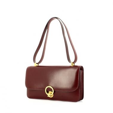 Bolso de mano Hermes en cuero box color burdeos