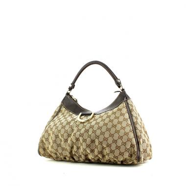 Bolso de mano Gucci en lona Monogram revestida beige y cuero marrón