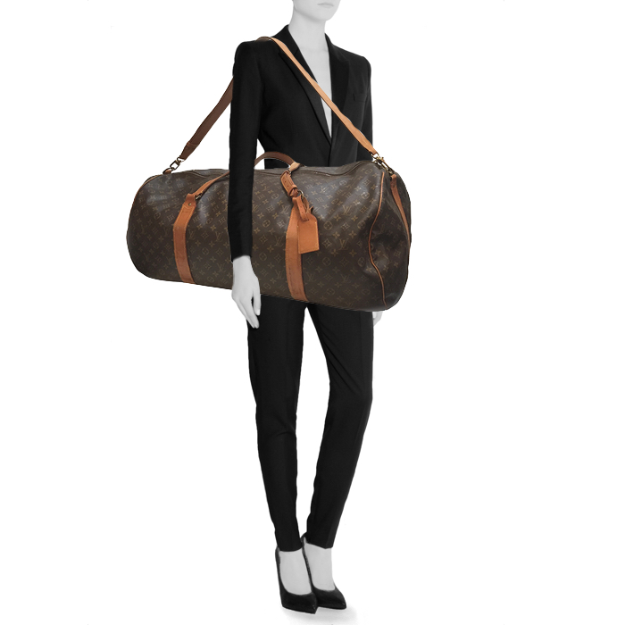 Louis Vuitton travel bag in monogram canvas and natural leather - Detail D1