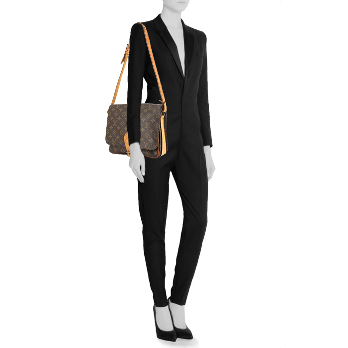 Sac besace Louis Vuitton en toile monogram et cuir naturel - Detail D1