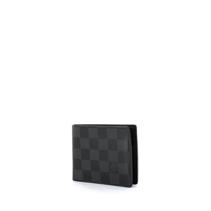 Louis Vuitton cartera en piel color negra 💲5,500 buen estado, en la parte  inferior derecha tiene grabado LV, en las esquinas estructura un …