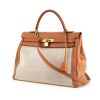 Hermes Kelly 35 cm bag worn on the shoulder or carried in the hand in gold Chamonix  leather and beige canvas - 00pp thumbnail
