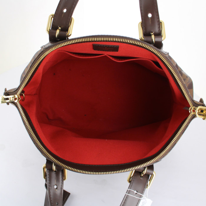 Louis Vuitton handbag in damier canvas and brown leather - Detail D2