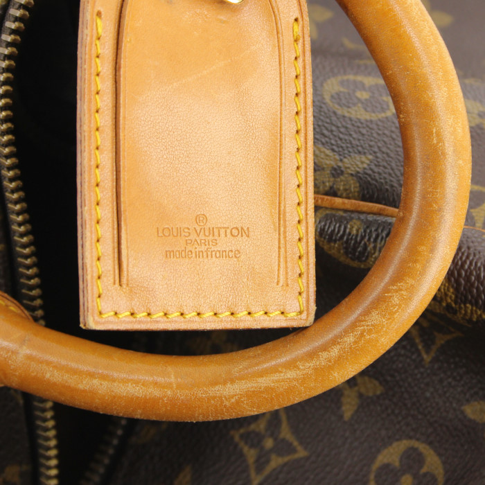 Sac de voyage Louis Vuitton Keepall 55 cm en toile monogram et cuir naturel - Detail D3