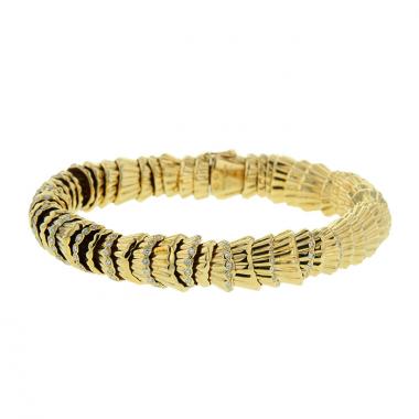 Brazalete articulado Boucheron Exquises confidences en oro amarillo y diamantes Brazalete articulado Boucheron Exquises confidences en oro amarillo y diamantes