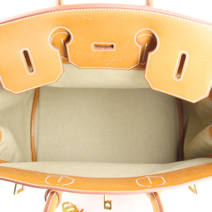 Hermes Haut à Courroies weekend bag in beige and orange canvas and gold Barenia leather - Detail D2