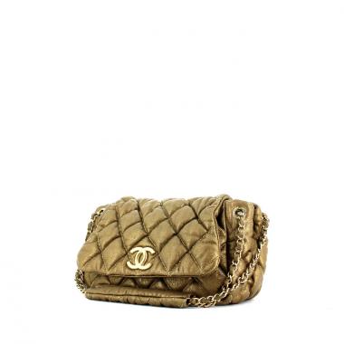 Bolso de mano Chanel en cuero acolchado dorado