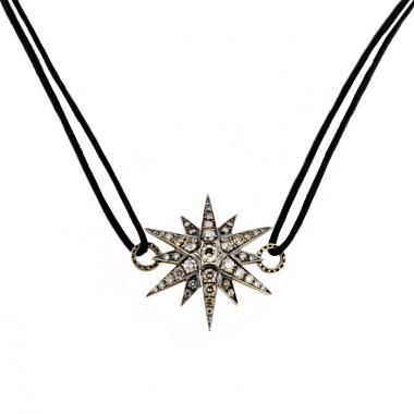 Pendentif H. Stern en or noirci,  diamants champagne et diamants cognac