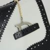 Bolso de mano Dior D'Trick en charol negro y blanco - Detail D4 thumbnail