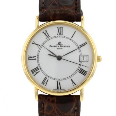 Baume 
Mercier watch in yellow gold Circa  1990