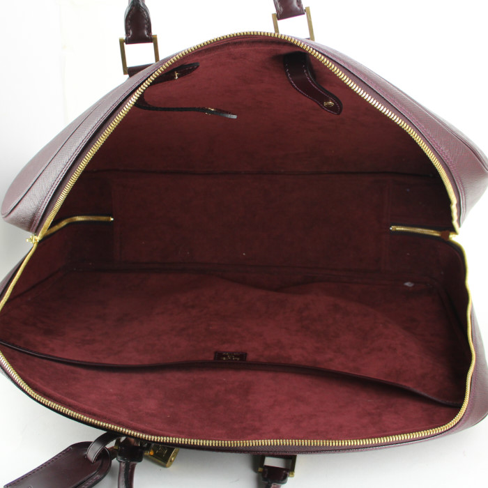 Maleta flexible Louis Vuitton en cuero taiga violeta - Detail D2