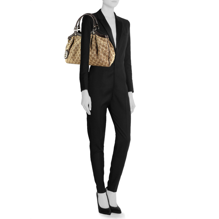 Gucci handbag in beige monogram canvas and brown leather - Detail D1