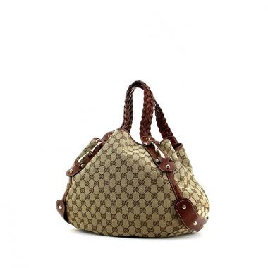 Gucci handbag in beige monogram canvas and brown leather