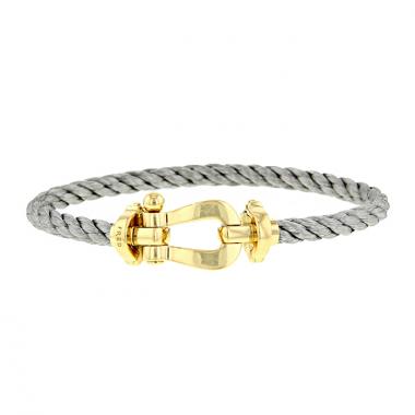 Sold at Auction: FRED BRACELET FORCE 10 A gold and steel