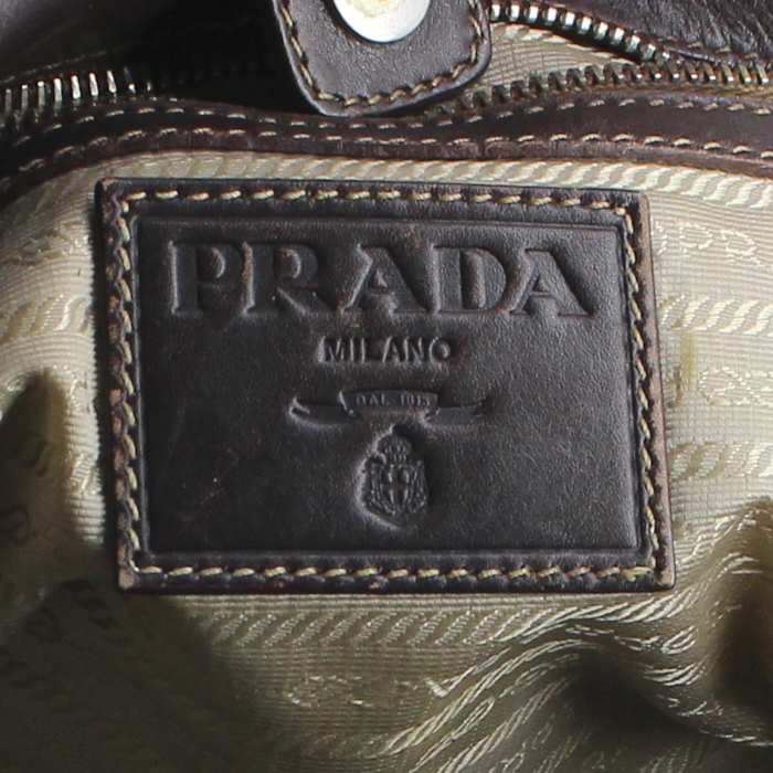 Prada handbag in brown leather and beige logo canvas - Detail D3