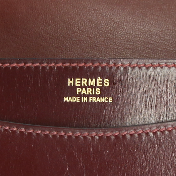 Bolso de mano Hermes Ring en cuero box color burdeos - Detail D4