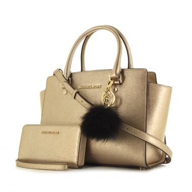 Bolso bandolera Michael Kors en cuero dorado