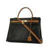 Hermes Kelly 35 cm handbag in black and gold bicolor togo leather - 00pp thumbnail