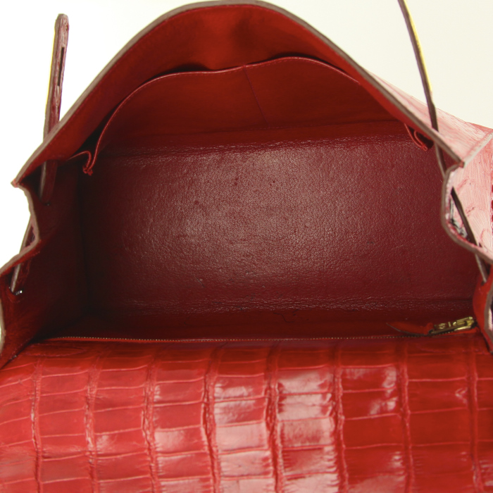 HERMES Kelly 28 cm cuir rouge braise avec anse tirette, clochette, traces stylos à l'intérieur, reteinte?  - Detail D3