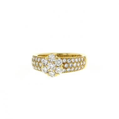 Sortija Van Cleef 
Arpels Fleurette modelo grande en oro amarillo y diamantes
