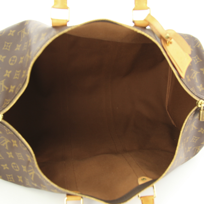 Louis Vuitton Keepall 55 cm travel bag in monogram canvas and natural leather - Detail D2
