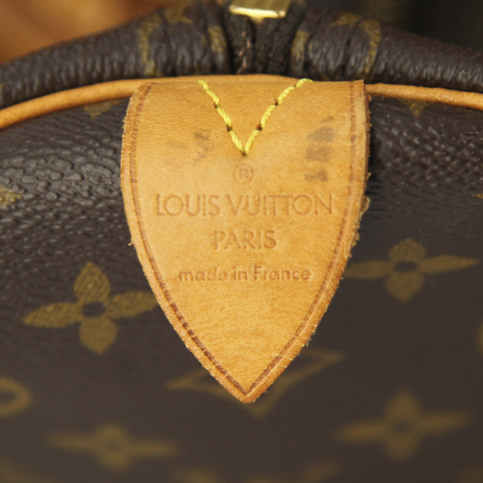 Louis Vuitton Keepall 55 cm travel bag in monogram canvas and natural leather - Detail D3