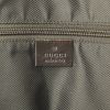 Gucci travel bag in beige monogram canvas and brown leather - Detail D4 thumbnail