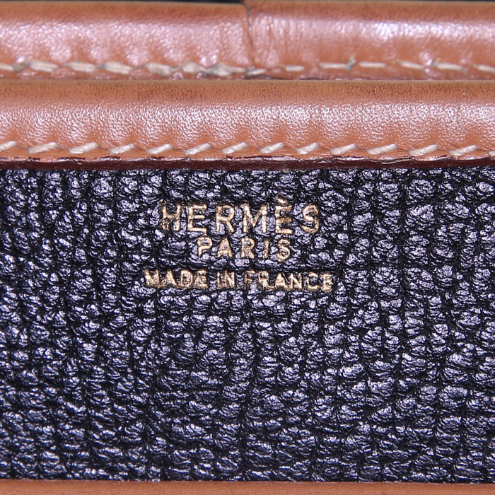 Hermes Nouméa handbag in black and gold Fjord leather - Detail D3