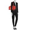 Prada handbag in red grained leather and beige canvas - Detail D1 thumbnail