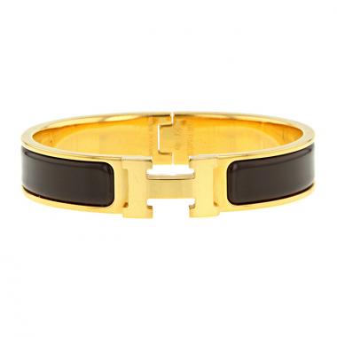 Opening Hermes Clic Clac medium model bracelet in gold plated and enamel