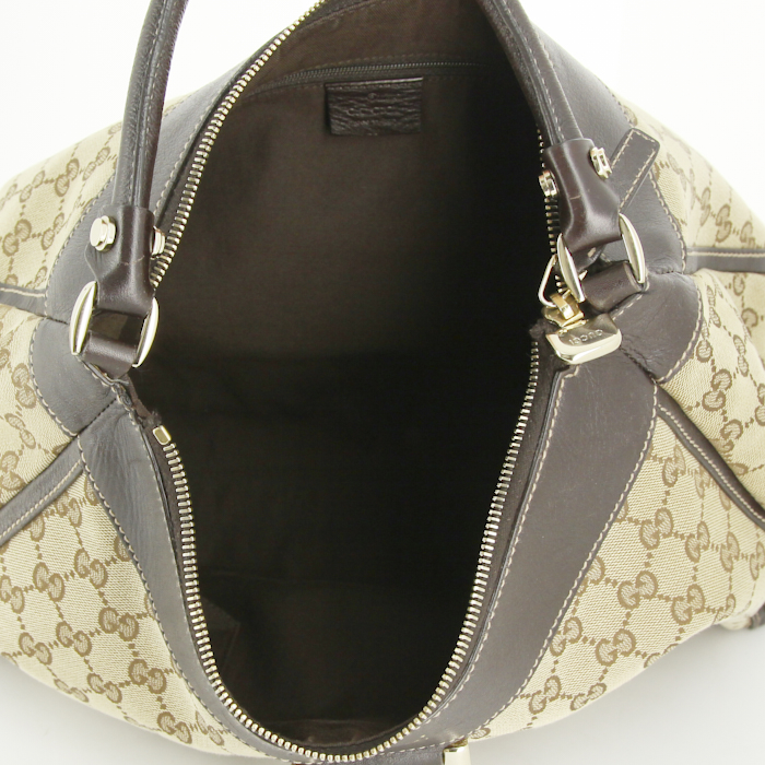 Gucci bag worn on the shoulder or carried in the hand in beige monogram canvas and chocolate brown leather - Detail D2