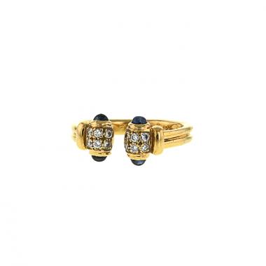 Bague époque années 90 Cartier Ellipse en or jaune,  saphir et diamants
