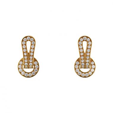 Paire de boucles d'oreilles Cartier Agrafe en or jaune et diamants