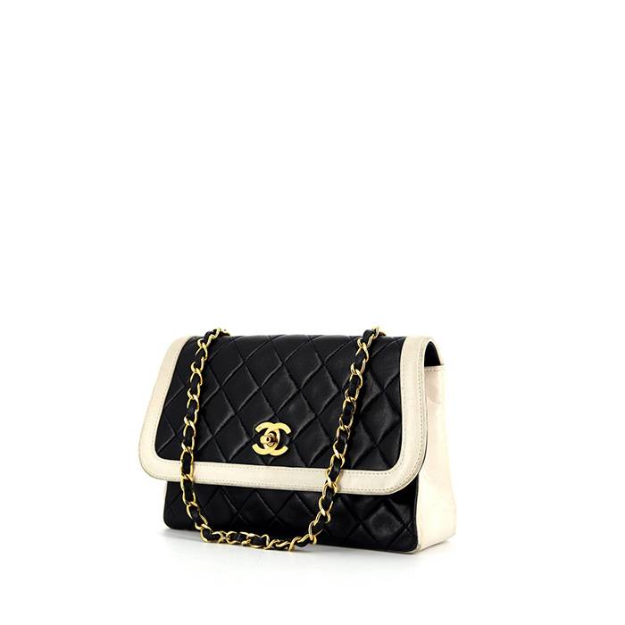 white vintage chanel bag black