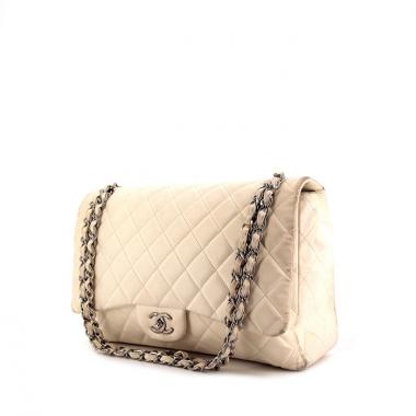 Chanel Timeless maxi jumbo handbag in beige quilted leather