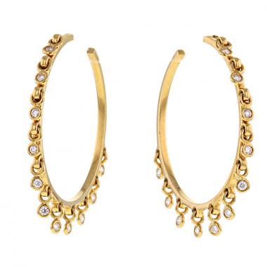 Par de criollas Dior Coquine modelo grande en oro amarillo y diamantes