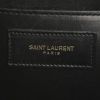 Saint Laurent Duffle small model handbag in black leather - Detail D4 thumbnail