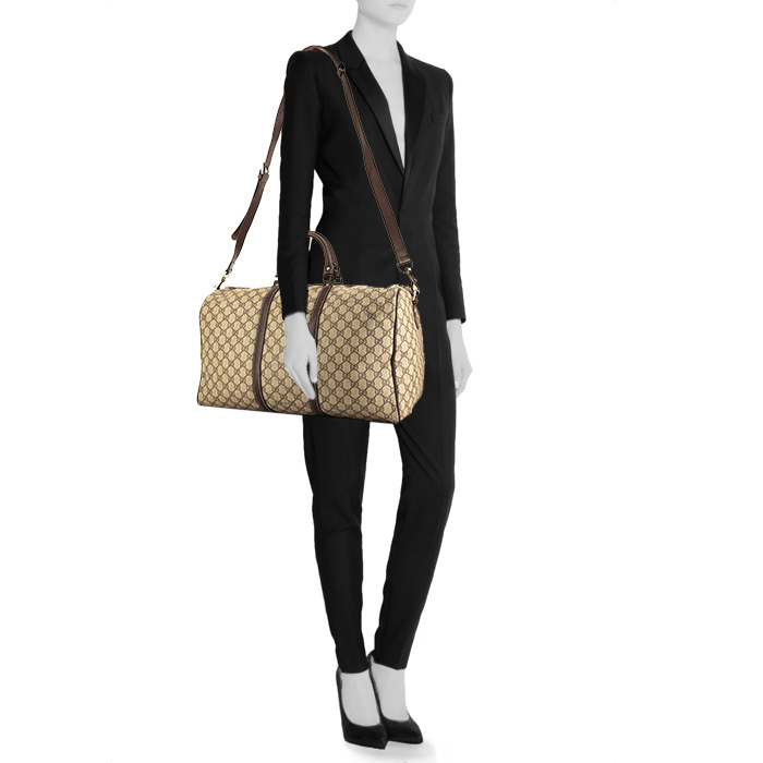 Gucci travel bag in beige monogram canvas and brown leather - Detail D1