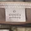 Gucci travel bag in beige monogram canvas and brown leather - Detail D4 thumbnail