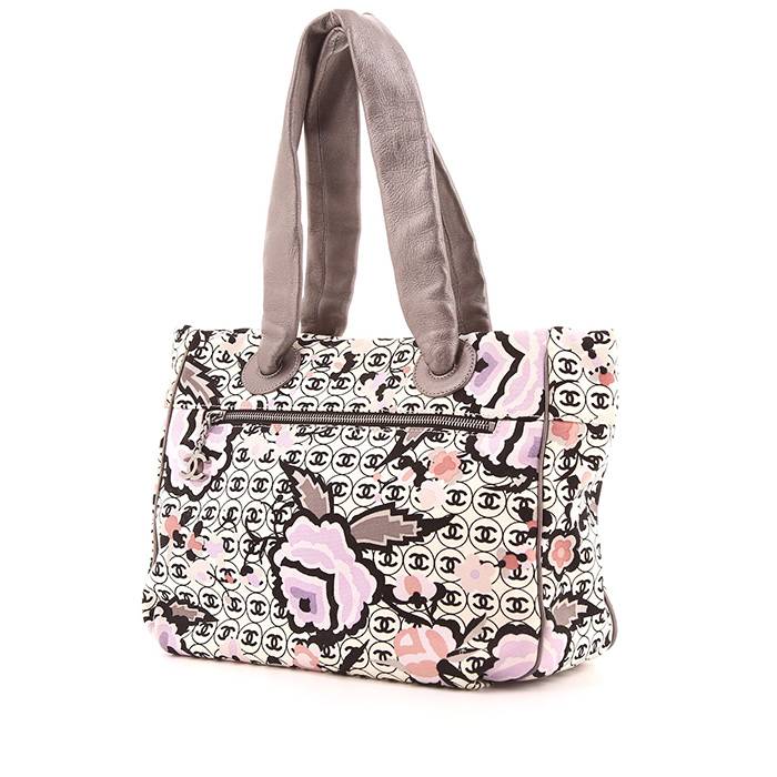 Bolso Cabás Chanel Petit Shopping en lona monogram multicolor rosa, negra, violeta y blanca y cuero parma