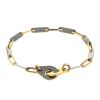 Dinh Van Menottes R12 bracelet in yellow gold and stainless steel - 00pp thumbnail