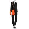 Hermes Evelyne medium model shoulder bag in orange togo leather - Detail D1 thumbnail