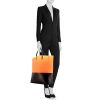 Celine shopping bag in black leather and orange rubber - Detail D1 thumbnail