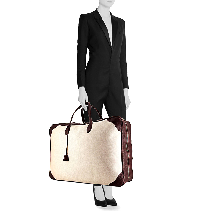Hermès Victoria travel bag in beige coated canvas and brown togo leather - Detail D1
