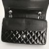 Chanel Timeless handbag in black patent quilted leather - Detail D5 thumbnail