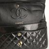 Chanel Timeless handbag in black patent quilted leather - Detail D4 thumbnail