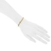 Chanel Camelia bracelet in yellow gold - Detail D1 thumbnail